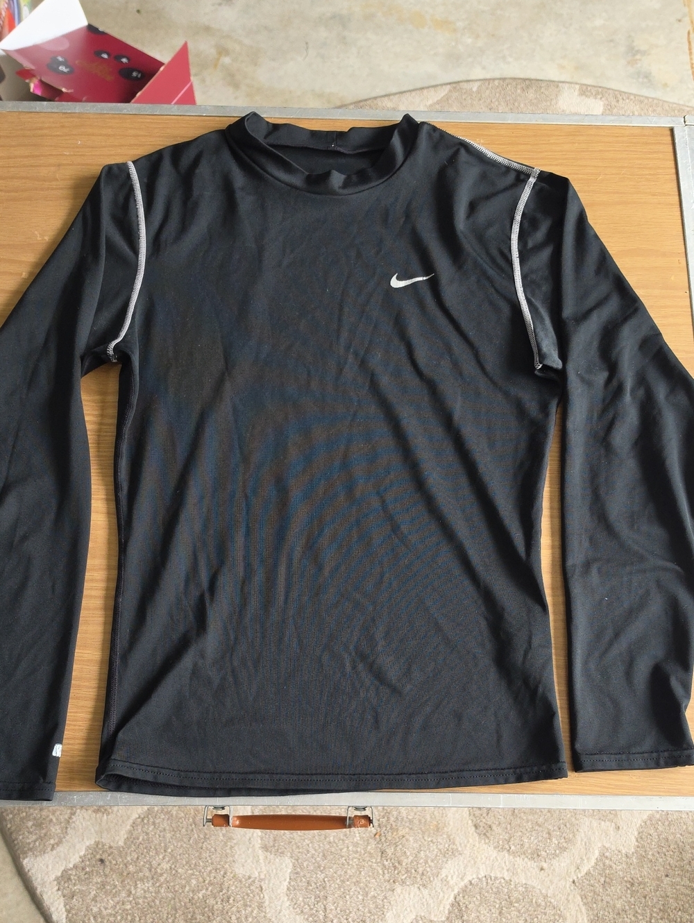 Nike Black Long Sleeve Performance Top with White Swoosh